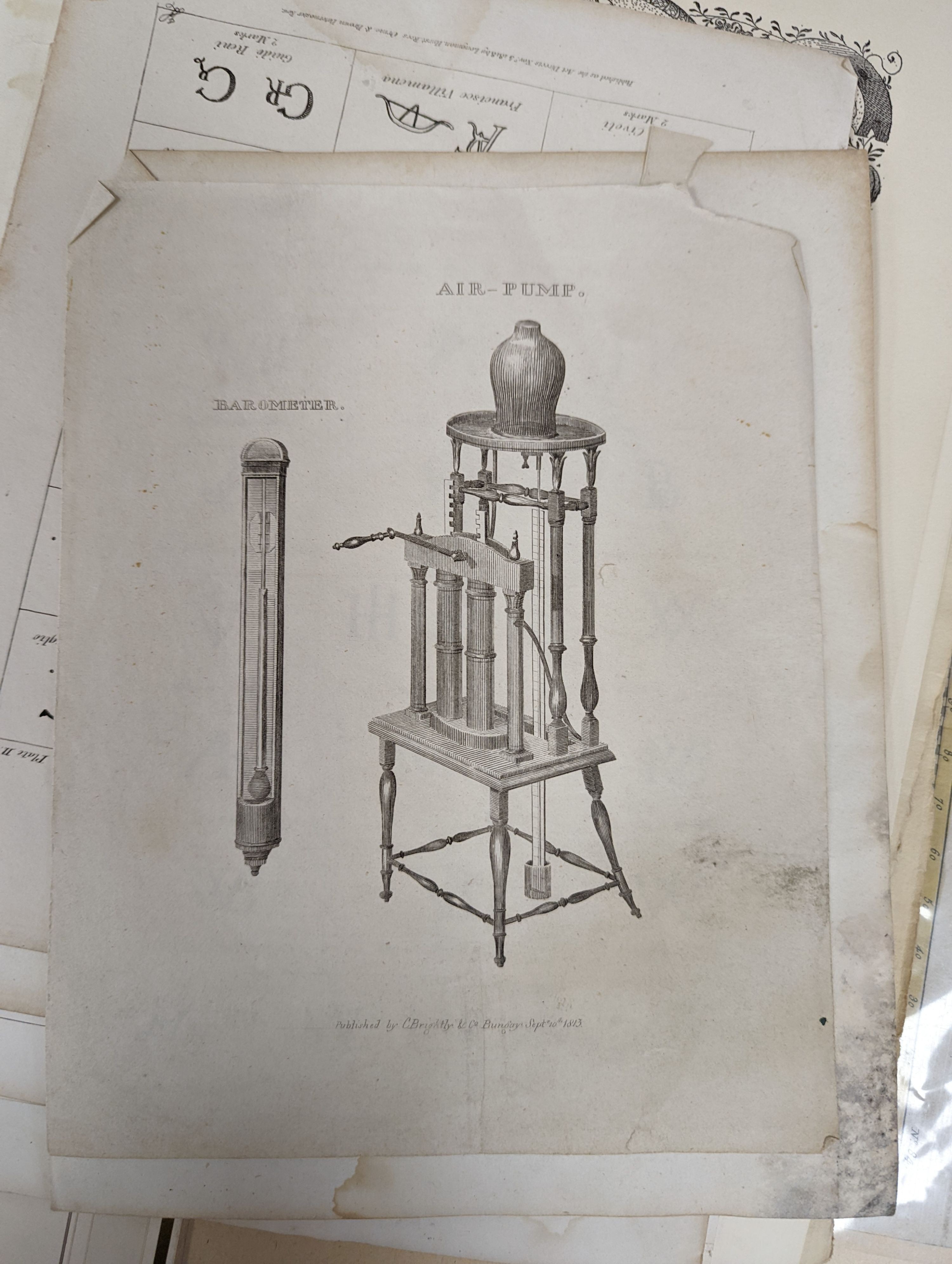 A folio of 18th/19th century maps and scientific engravings, including an engraving after Ludovico Lanberti, a map of the World plotting Bourgainvilles voyage of 1772